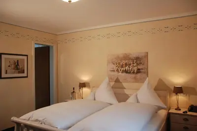 Ein Bett oder Betten in einem Zimmer der Unterkunft die Villa