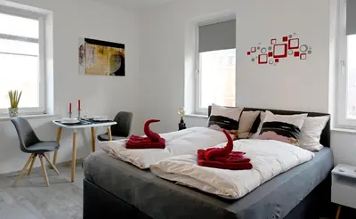 Ein Bett oder Betten in einem Zimmer der Unterkunft Gemütliches Appartement mit Netflix, Nespresso und Boxspringbett