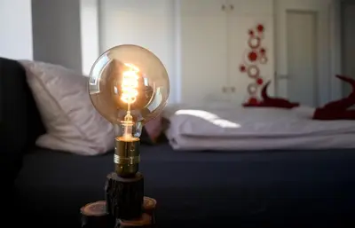 Ein Bett oder Betten in einem Zimmer der Unterkunft Gemütliches Appartement mit Netflix, Nespresso und Boxspringbett