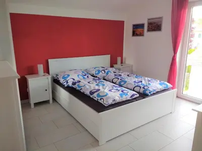 Ein Bett oder Betten in einem Zimmer der Unterkunft sehr schöne Ferienwohnung in Ebersberg bei München