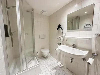 Ein Badezimmer in der Unterkunft Hotel Gasthof Alter Wirt