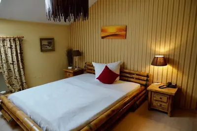Ein Bett oder Betten in einem Zimmer der Unterkunft Hotel Endorfer Hof