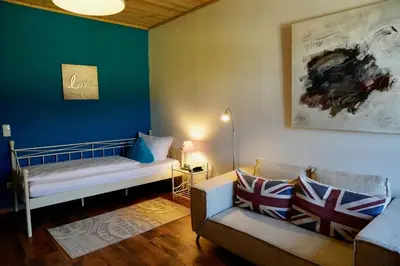 Ein Bett oder Betten in einem Zimmer der Unterkunft Hotel Endorfer Hof