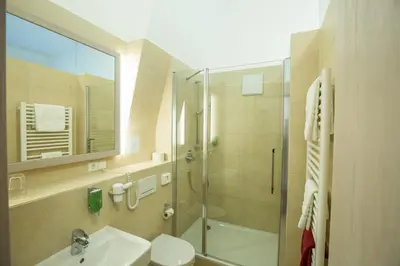 Ein Badezimmer in der Unterkunft Gästehaus der Katholischen Akademie in Bayern