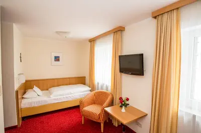 Ein Bett oder Betten in einem Zimmer der Unterkunft Gästehaus der Katholischen Akademie in Bayern