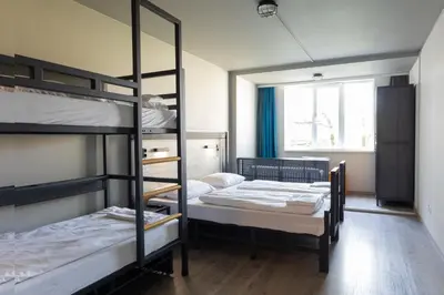 Ein Bett oder Betten in einem Zimmer der Unterkunft a&o München Hackerbrücke