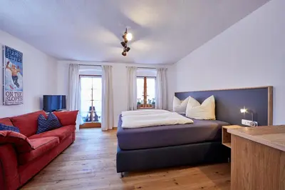Ein Bett oder Betten in einem Zimmer der Unterkunft FEWO Wamberg