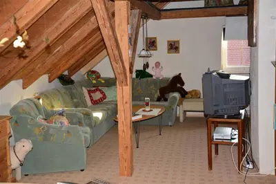 Ein Sitzbereich in der Unterkunft Ferienwohnung Leich