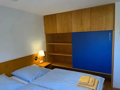 Ein Bett oder Betten in einem Zimmer der Unterkunft Landhaus Renata Bayrischzell