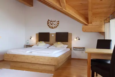 Ein Bett oder Betten in einem Zimmer der Unterkunft Gästehaus Burgmayr