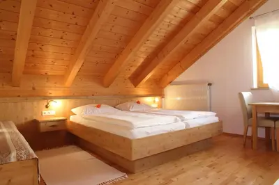 Ein Bett oder Betten in einem Zimmer der Unterkunft Gästehaus Burgmayr