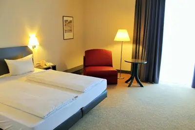 Ein Bett oder Betten in einem Zimmer der Unterkunft Hotel Wörth