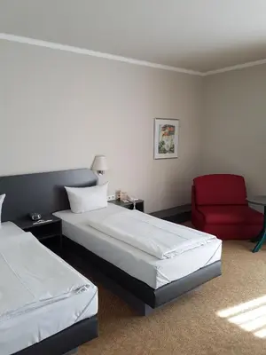 Ein Bett oder Betten in einem Zimmer der Unterkunft Hotel Wörth