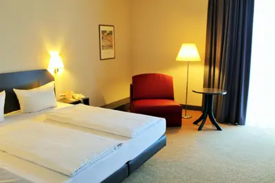 Ein Bett oder Betten in einem Zimmer der Unterkunft Hotel Wörth