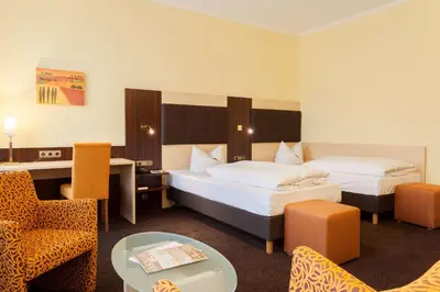 Ein Bett oder Betten in einem Zimmer der Unterkunft Best Western Hotel Augusta