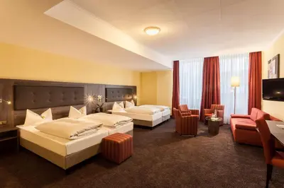 Ein Bett oder Betten in einem Zimmer der Unterkunft Best Western Hotel Augusta
