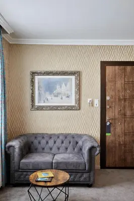 Ein Sitzbereich in der Unterkunft Atlas Posthotel