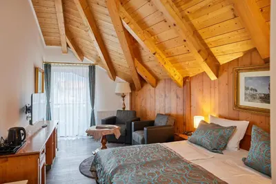 Ein Bett oder Betten in einem Zimmer der Unterkunft Atlas Posthotel