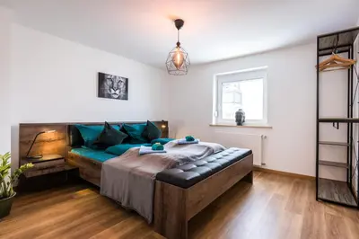 Ein Bett oder Betten in einem Zimmer der Unterkunft Arbio I Cozy Apartments Augsburg-Lechhausen