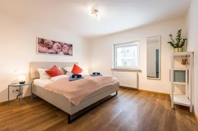 Ein Bett oder Betten in einem Zimmer der Unterkunft Arbio I Cozy Apartments Augsburg-Lechhausen