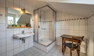 Ein Badezimmer in der Unterkunft Hotel Schmiedhubers