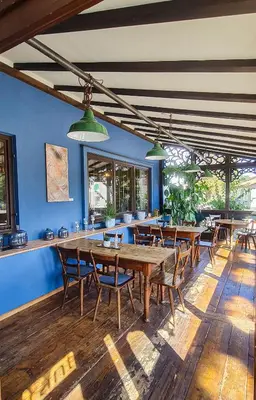 Ein Restaurant oder anderes Speiselokal in der Unterkunft Hotel Schmiedhubers