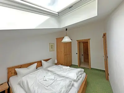 Ein Bett oder Betten in einem Zimmer der Unterkunft Gschwendtnerhof App22 Böhm