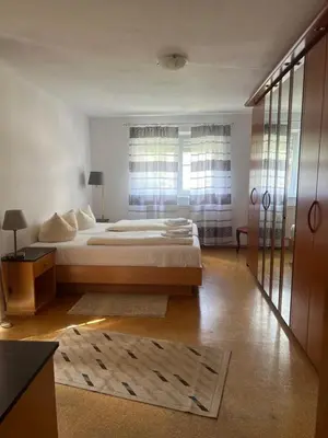 Ein Bett oder Betten in einem Zimmer der Unterkunft Hotelpension zum Gockl