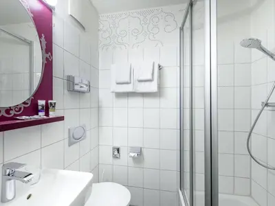 Ein Badezimmer in der Unterkunft Mercure München am Olympiapark
