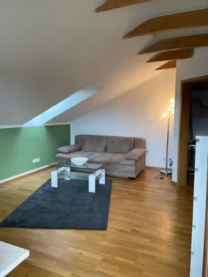 Ein Sitzbereich in der Unterkunft Ferienwohnung am Starnberger See