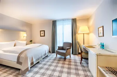 Ein Bett oder Betten in einem Zimmer der Unterkunft Hotel SchreiberHof