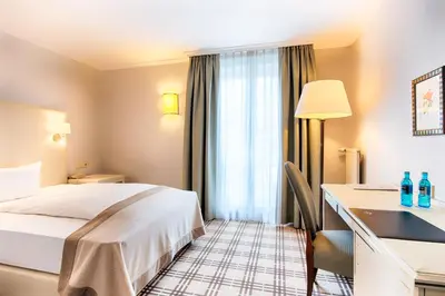 Ein Bett oder Betten in einem Zimmer der Unterkunft Hotel SchreiberHof
