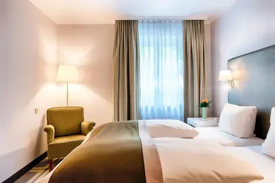 Ein Bett oder Betten in einem Zimmer der Unterkunft Hotel SchreiberHof