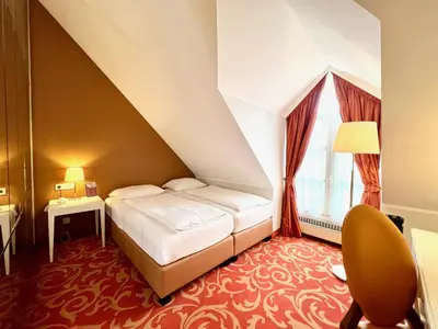 Ein Bett oder Betten in einem Zimmer der Unterkunft Hotel SchreiberHof