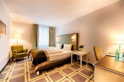 Ein Bett oder Betten in einem Zimmer der Unterkunft Hotel SchreiberHof