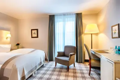 Ein Bett oder Betten in einem Zimmer der Unterkunft Hotel SchreiberHof