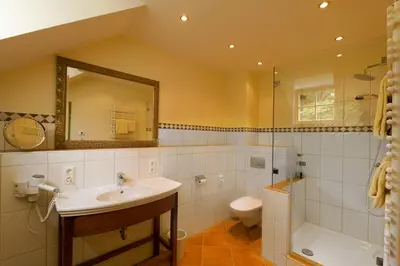 Ein Badezimmer in der Unterkunft Hotel Goldene Sonne
