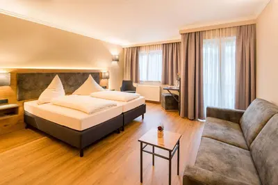 Ein Bett oder Betten in einem Zimmer der Unterkunft Hotel-Gasthof Huber