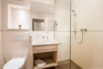 Ein Badezimmer in der Unterkunft Hotel-Gasthof Huber