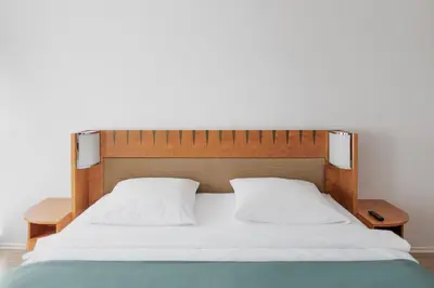 Ein Bett oder Betten in einem Zimmer der Unterkunft Hotel Cristallo