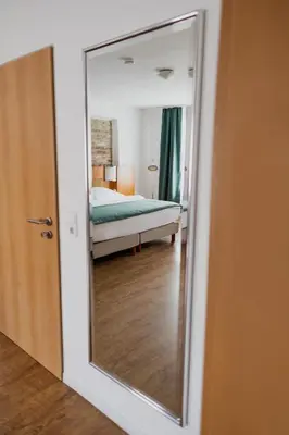 Ein Bett oder Betten in einem Zimmer der Unterkunft Hotel Cristallo