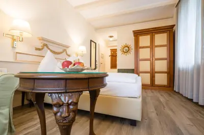 Ein Bett oder Betten in einem Zimmer der Unterkunft Simones Hotel Fürstenhof