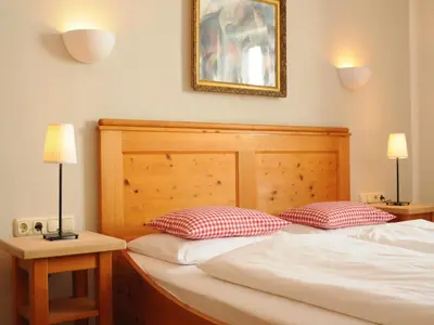 Ein Bett oder Betten in einem Zimmer der Unterkunft Seeleitenhof