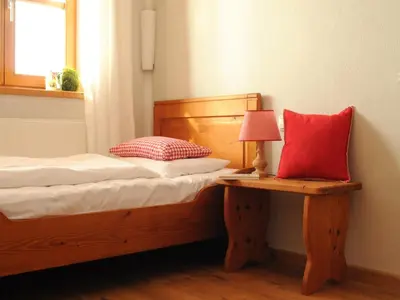 Ein Bett oder Betten in einem Zimmer der Unterkunft Seeleitenhof