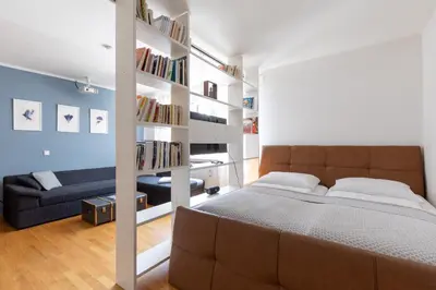 Ein Bett oder Betten in einem Zimmer der Unterkunft Mozart Apartment München