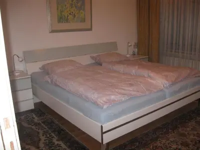 Ein Bett oder Betten in einem Zimmer der Unterkunft Ferienwohnung Plaggemars Verm nur Sonntag auf Samstag