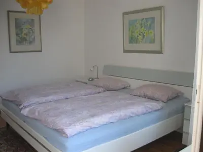 Ein Bett oder Betten in einem Zimmer der Unterkunft Ferienwohnung Plaggemars Verm nur Sonntag auf Samstag