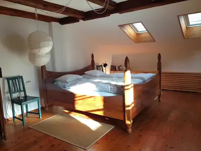 Ein Bett oder Betten in einem Zimmer der Unterkunft Ferienwohnung Hofen 5