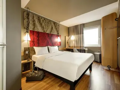 Ein Bett oder Betten in einem Zimmer der Unterkunft ibis Hotel München Messe