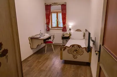 Ein Bett oder Betten in einem Zimmer der Unterkunft Gasthof Alter Wirt